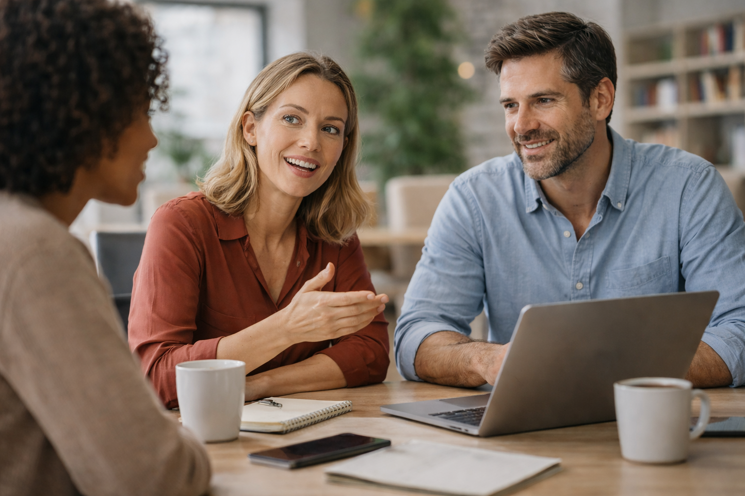 employees sat around desk